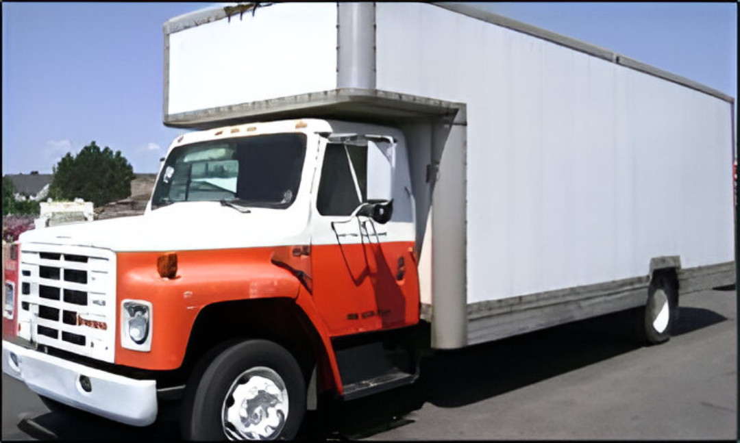 A Movers of Houston truck and team ready for a job.